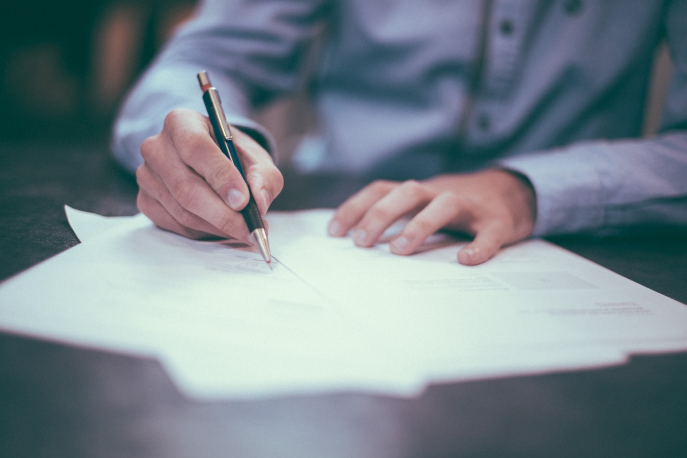 Identity verification and incorporation paperwork — KYC (ID scan, selfie, SSN, address) must pass for every founder before any entity can be filed, and the sensitive PII lands in an encrypted identity vault, not your database.